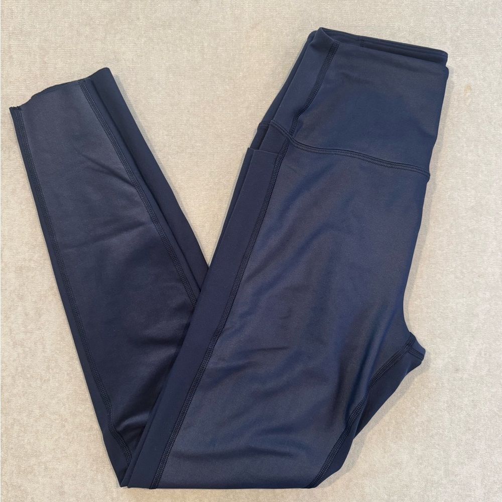 Shiny navy blue Peloton legging